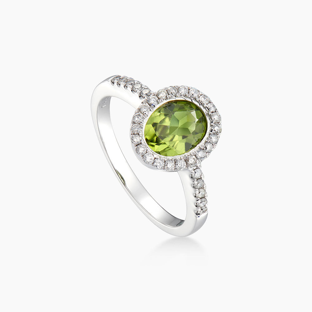 Oval Cut Green Peridot and Diamond Ring in 375/9K White Gold 24689