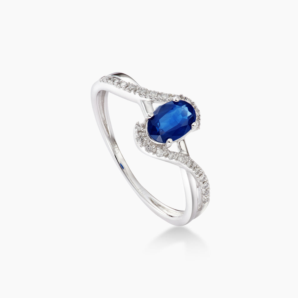 Fancy Twisted Blue Sapphire Diamond Ring in 375/9K White Gold 24887